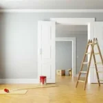 Finishing interior painting in a southwest Florida home.